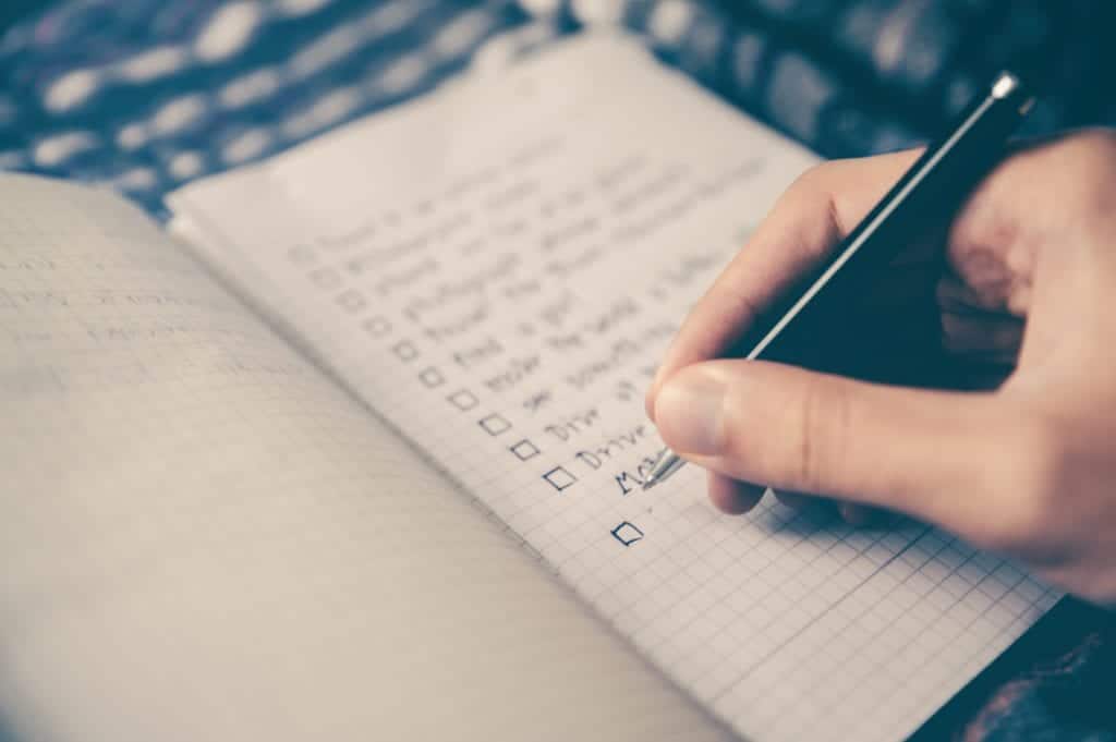 Student organizing scholarship application notes